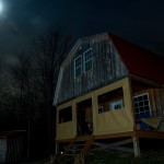 Cabin under moonlight